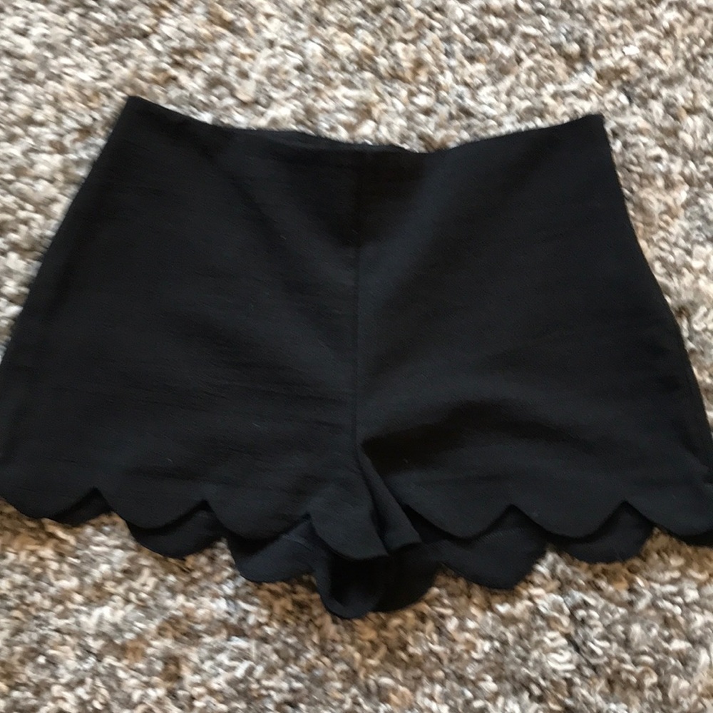 Black scallop shorts